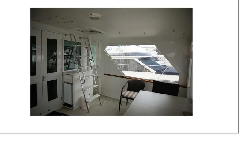 "focus" Yacht Photos Pics Interior of 1977 Hatteras 58 Yacht Fisherman with seating and ladder.