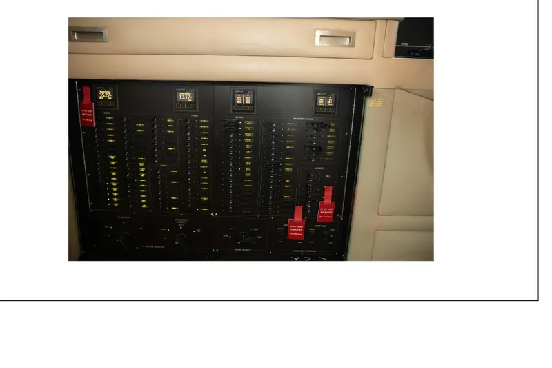 "focus" Yacht Photos Pics Electrical panel of a 1977 Hatteras 58 Yacht Fisherman, featuring various switches and indicators.