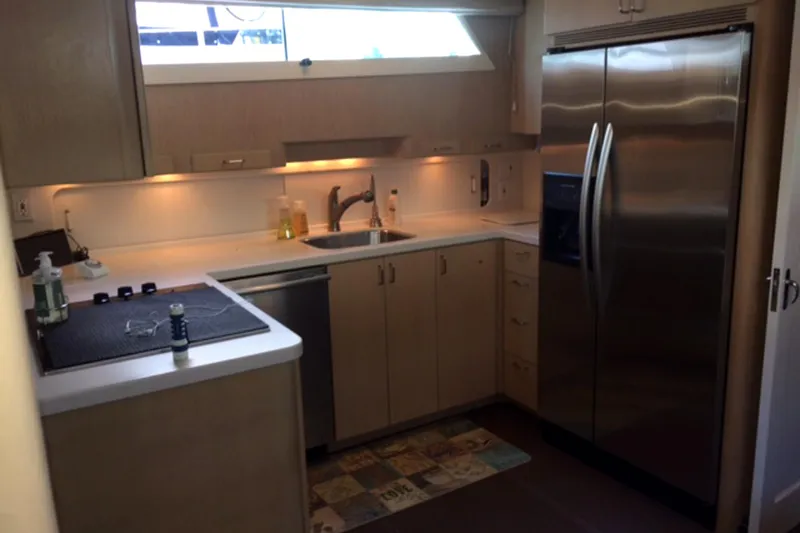 "focus" Yacht Photos Pics 1977 Hatteras 58 Yacht Fisherman kitchen with modern appliances and sleek cabinetry.