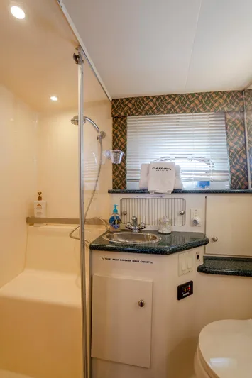  Yacht Photos Pics Bathroom interior of 2000 Carver 356 Aft Cabin Motor Yacht with shower and sink.