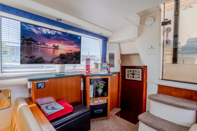 Yacht Photos Pics Interior of 2000 Carver 356 Aft Cabin Motor Yacht with TV and stairs.
