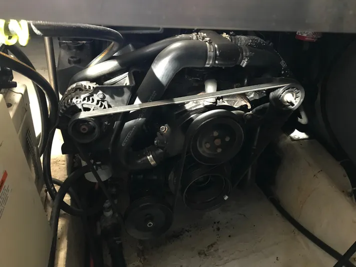  Yacht Photos Pics Engine compartment of a 2000 Carver 356 Aft Cabin Motor Yacht, showcasing mechanical components.