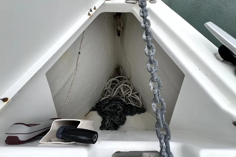 Knot Behaving Yacht Photos Pics Anchor chain and rope storage on 2014 Jeanneau Sun Odyssey 379 sailboat.
