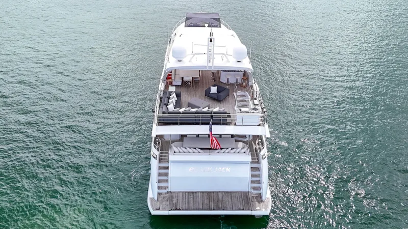  Yacht Photos Pics Aerial view of 2017 Azimut 95 Raised Pilothouse yacht on open water.