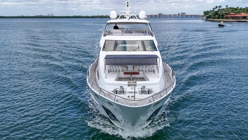  Yacht Photos Pics Luxurious 2017 Azimut 95 Raised Pilothouse yacht cruising on open water.