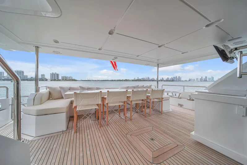  Yacht Photos Pics Luxurious 2017 Azimut 95 Raised Pilothouse yacht deck with seating and ocean view.