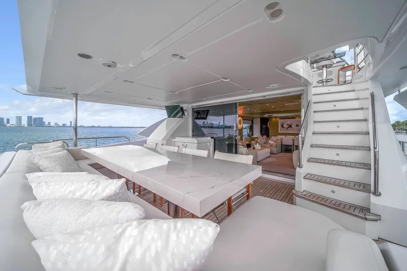  Yacht Photos Pics Luxurious 2017 Azimut 95 yacht deck with elegant seating and ocean view.