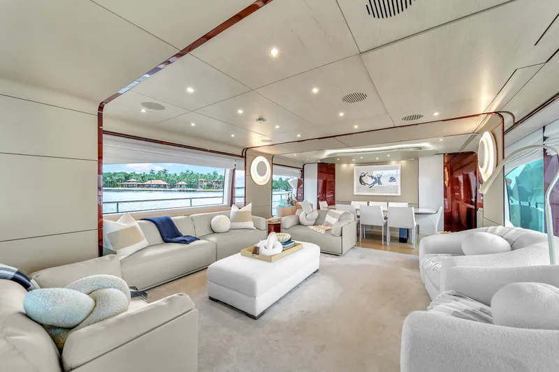  Yacht Photos Pics Luxurious interior of 2017 Azimut 95 Raised Pilothouse yacht with elegant seating and modern decor.
