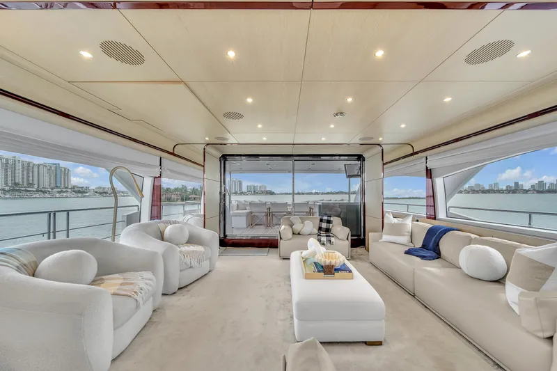  Yacht Photos Pics Luxurious interior of 2017 Azimut 95 Raised Pilothouse yacht with elegant seating and panoramic views.