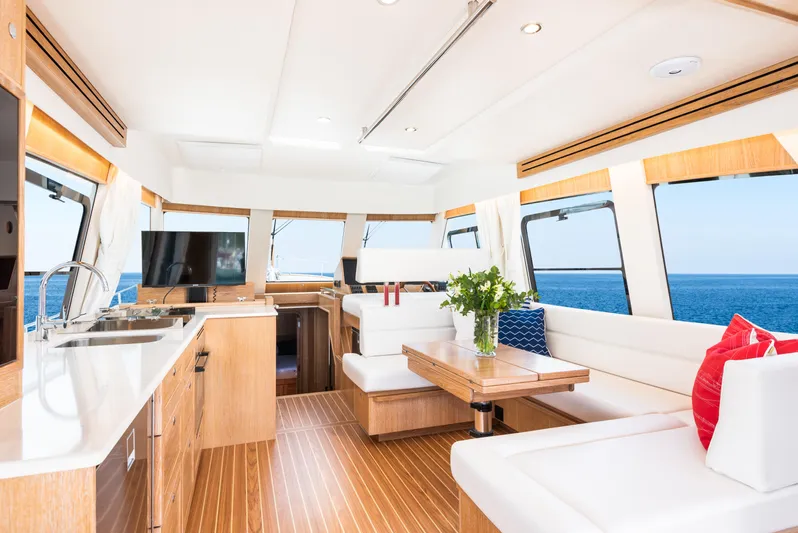  Yacht Photos Pics Luxurious interior of 2025 Sasga Yachts Menorquin 55 Flybridge with ocean view.