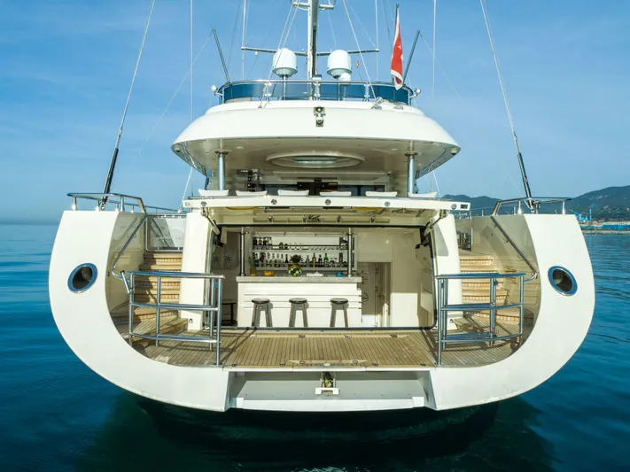 Aresteas Yacht Photos Pics Luxury yacht with open bar area, Custom Yildizlar 2017 model, docked on calm water.