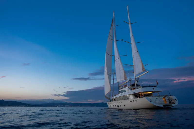 Aresteas Yacht Photos Pics Sailing yacht Yildizlar 2017 at sunset on calm sea.