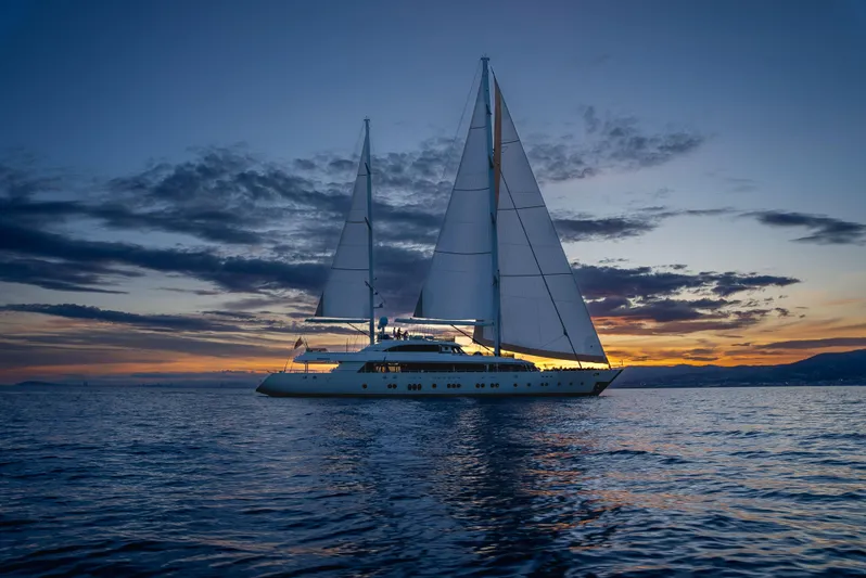 Aresteas Yacht Photos Pics Sailing yacht "Yildizlar" at sunset, Custom model, 2017, on calm ocean waters.