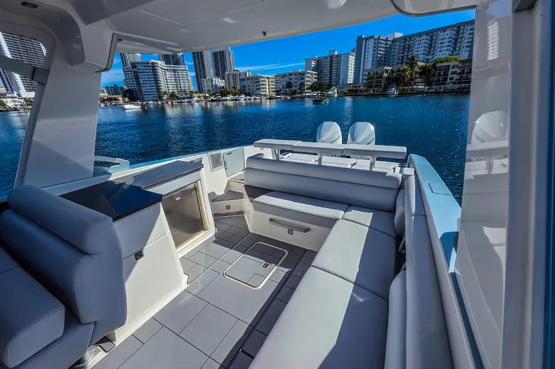  Yacht Photos Pics Luxurious 2022 Aviara AV32 OB boat interior with waterfront cityscape view.