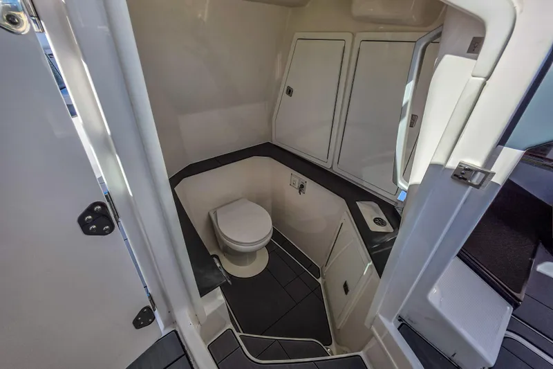  Yacht Photos Pics 2022 Aviara AV32 OB boat bathroom interior with modern fixtures and sleek design.