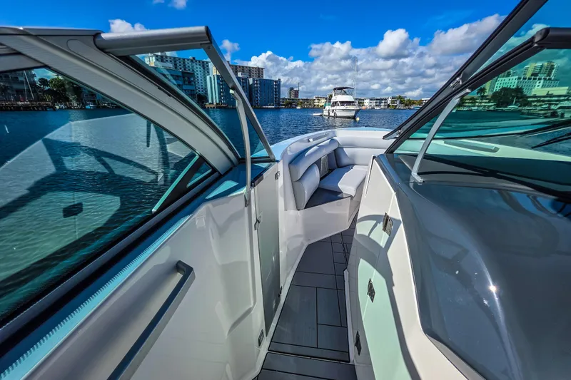  Yacht Photos Pics 2022 Aviara AV32 OB boat interior with sleek design and waterfront view.
