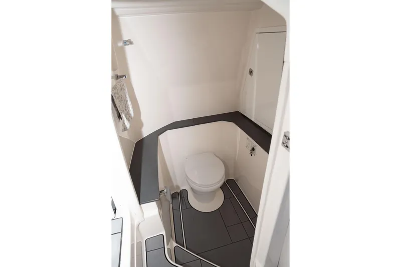  Yacht Photos Pics 2022 Aviara AV32 OB boat bathroom interior with modern design and compact layout.