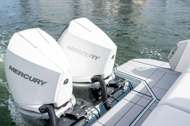  Yacht Photos Pics 2022 Aviara AV32 OB boat with dual Mercury outboard engines on water.