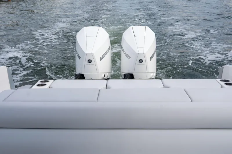  Yacht Photos Pics 2022 Aviara AV32 OB boat with dual Mercury outboard engines on water.