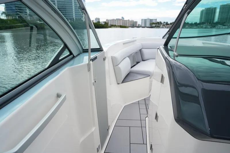  Yacht Photos Pics 2022 Aviara AV32 OB boat interior with sleek design and waterfront view.