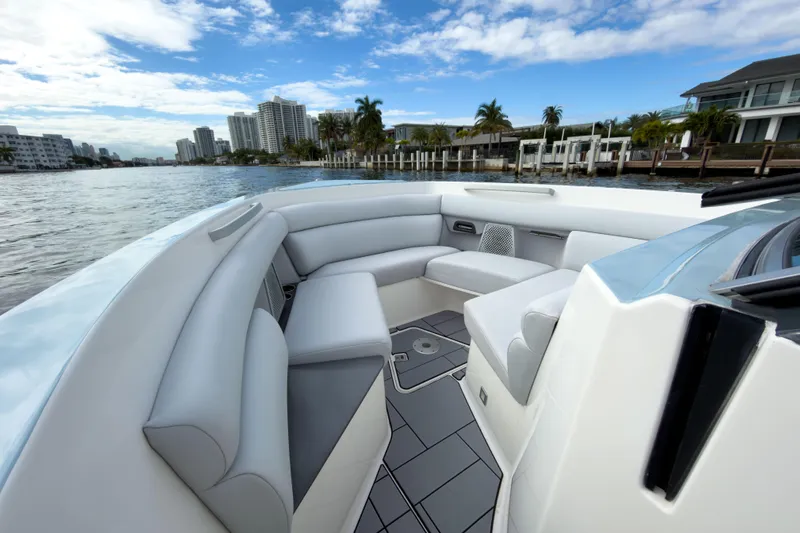  Yacht Photos Pics Luxurious 2022 Aviara AV32 OB boat interior with waterfront cityscape view.