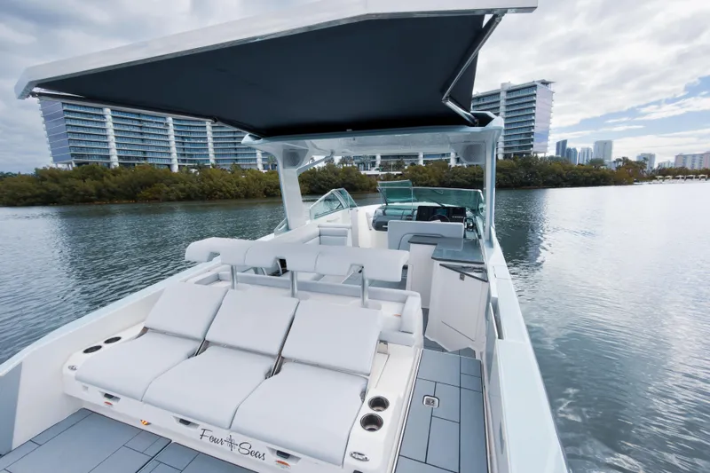  Yacht Photos Pics 2022 Aviara AV32 OB luxury boat with sleek design on calm water.