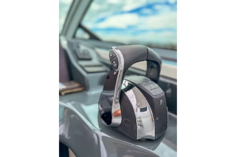  Yacht Photos Pics Throttle control of 2022 Aviara AV32 OB boat, featuring sleek design and modern technology.
