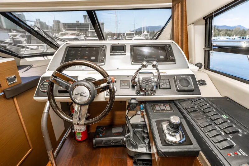 Waterfront III Yacht Photos Pics 2014 Sea Ray 510 Fly yacht helm with modern controls and navigation systems.