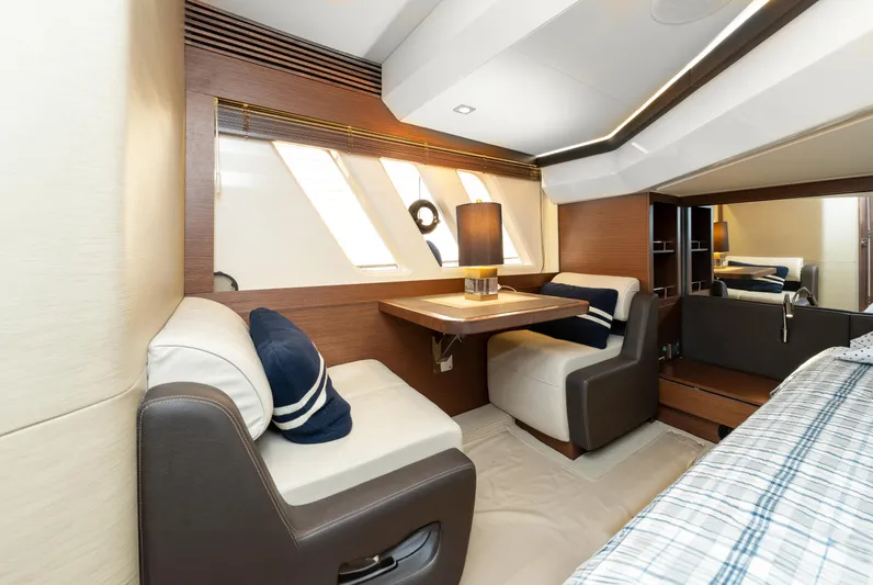 Waterfront III Yacht Photos Pics Luxurious interior of 2014 Sea Ray 510 Fly yacht with elegant seating and table.