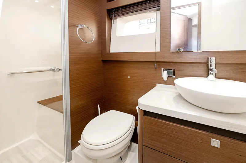 Waterfront III Yacht Photos Pics Luxurious bathroom in 2014 Sea Ray 510 Fly yacht with modern fixtures.