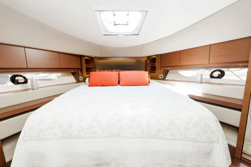Waterfront III Yacht Photos Pics Luxurious bedroom interior of 2014 Sea Ray 510 Fly yacht with skylight and modern design.