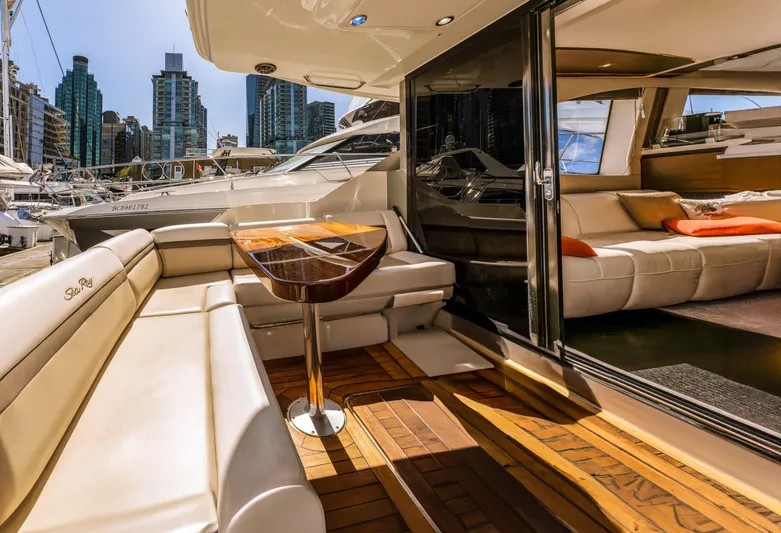 Waterfront III Yacht Photos Pics Luxurious 2014 Sea Ray 510 Fly yacht with elegant interior and city skyline view.