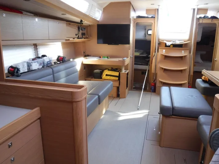 Gypsy Yacht Photos Pics Interior of 2015 Dufour 500 Grand Large yacht with modern furnishings and ample seating.