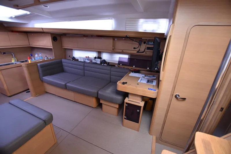 Gypsy Yacht Photos Pics Interior of 2015 Dufour 500 Grand Large yacht with modern seating and navigation area.