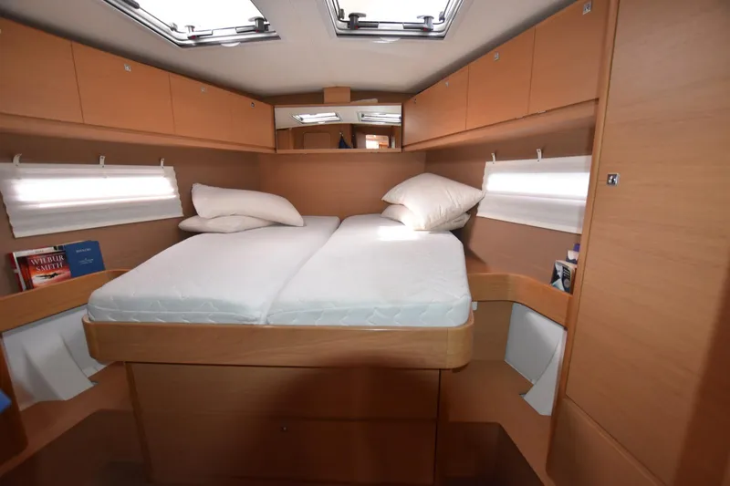 Gypsy Yacht Photos Pics Cozy cabin interior of 2015 Dufour 500 Grand Large yacht with double bed.