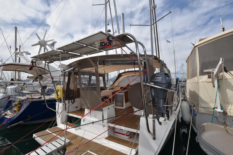 Gypsy Yacht Photos Pics 2015 Dufour 500 Grand Large yacht docked in marina, featuring spacious deck and canopy.