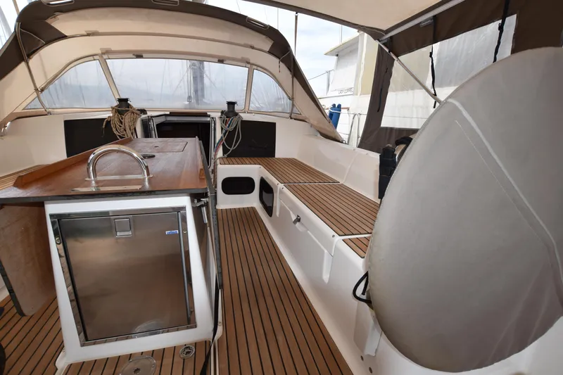Gypsy Yacht Photos Pics 2015 Dufour 500 Grand Large sailing yacht cockpit with teak flooring and modern amenities.