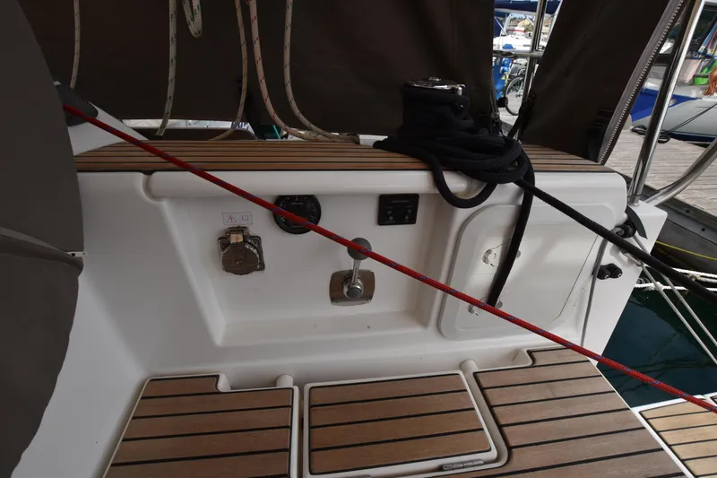 Gypsy Yacht Photos Pics 2015 Dufour 500 Grand Large yacht deck with teak flooring and control panel.