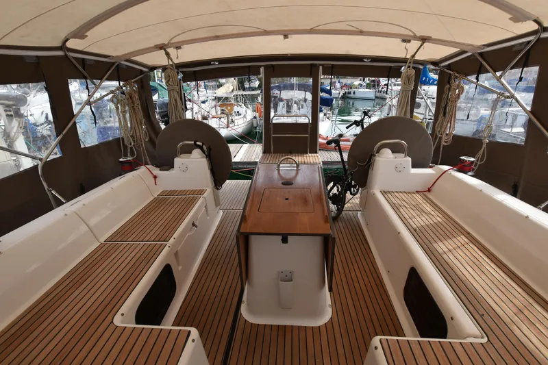 Gypsy Yacht Photos Pics Spacious cockpit of 2015 Dufour 500 Grand Large sailing yacht with teak flooring and seating.