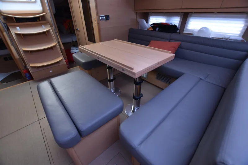 Gypsy Yacht Photos Pics Interior of 2015 Dufour 500 Grand Large yacht with modern seating and table.