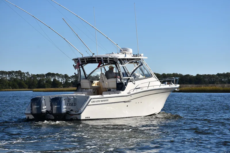  Yacht Photos Pics 2017 Grady-White Express 330 boat cruising on a sunny day.
