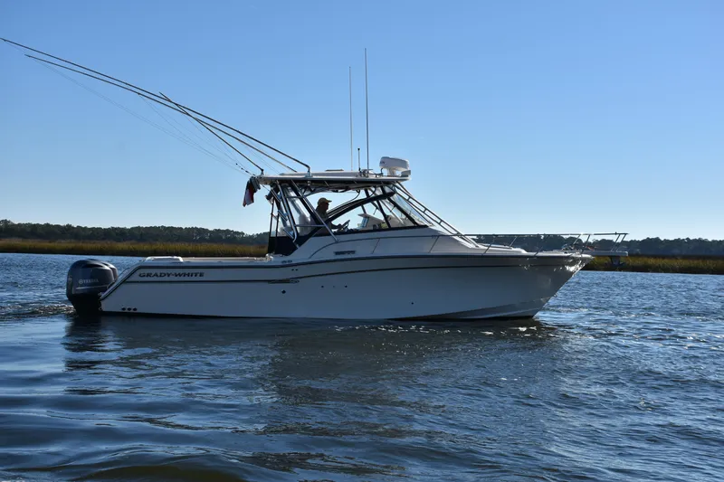  Yacht Photos Pics 2017 Grady-White Express 330 boat cruising on a sunny day.