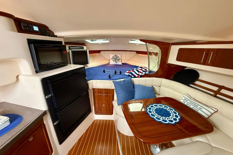  Yacht Photos Pics Luxurious 2008 Grady-White Express 360 cabin interior with cozy seating and modern amenities.