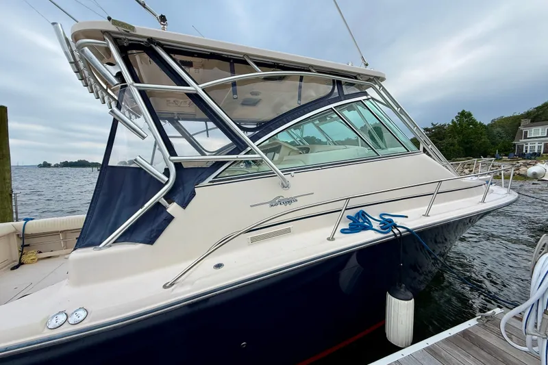  Yacht Photos Pics 2008 Grady-White Express 360 boat docked by the water on a cloudy day.