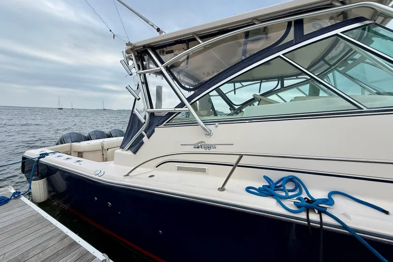  Yacht Photos Pics 2008 Grady-White Express 360 boat docked by the sea with blue ropes.