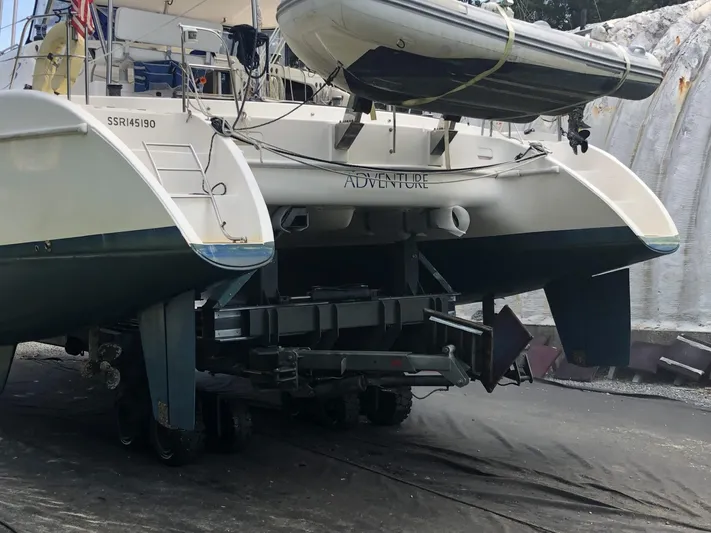 Adventure Yacht Photos Pics Broadblue 435 catamaran from 2010 on trailer, with dinghy on deck.