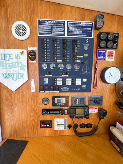 Adventure Yacht Photos Pics Control panel of a 2010 Broadblue 435 catamaran with navigation instruments and decor.