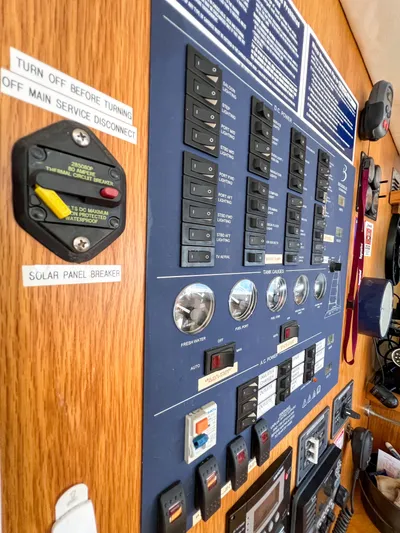 Adventure Yacht Photos Pics Control panel of a 2010 Broadblue 435 catamaran with switches and labels.