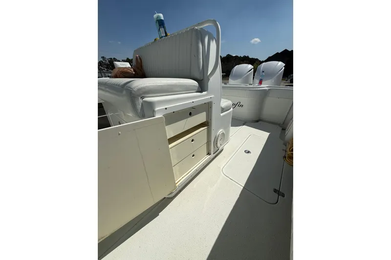 Cut Loose Yacht Photos Pics 2013 Yellowfin 32 Offshore boat interior with seating and storage compartments.