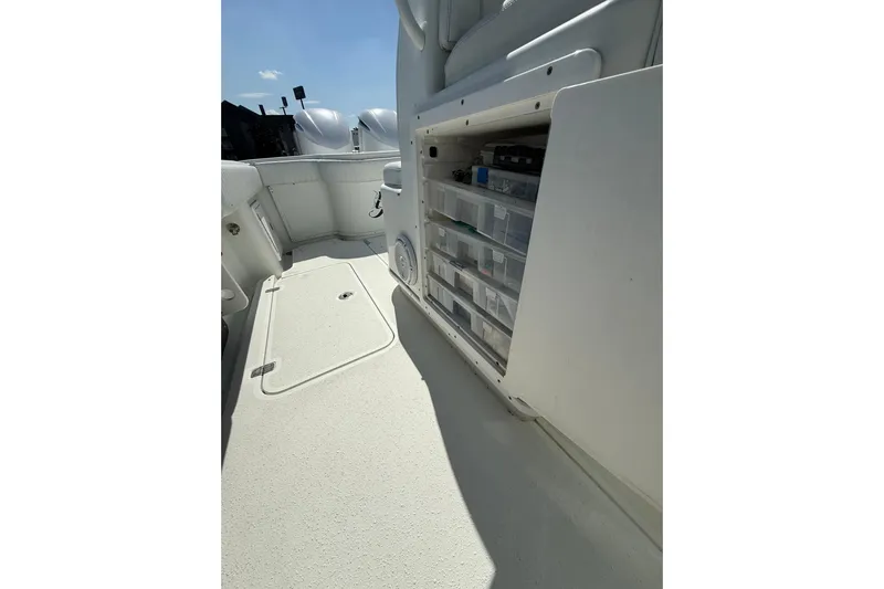 Cut Loose Yacht Photos Pics 2013 Yellowfin 32 Offshore boat interior with storage compartments and seating.